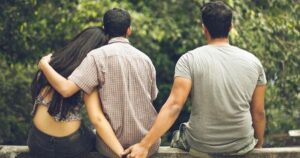 Article 6 Two individuals discussing legal strategies with a lawyer at a Bangkok law firm, highlighting expertise in handling adultery case defenses.